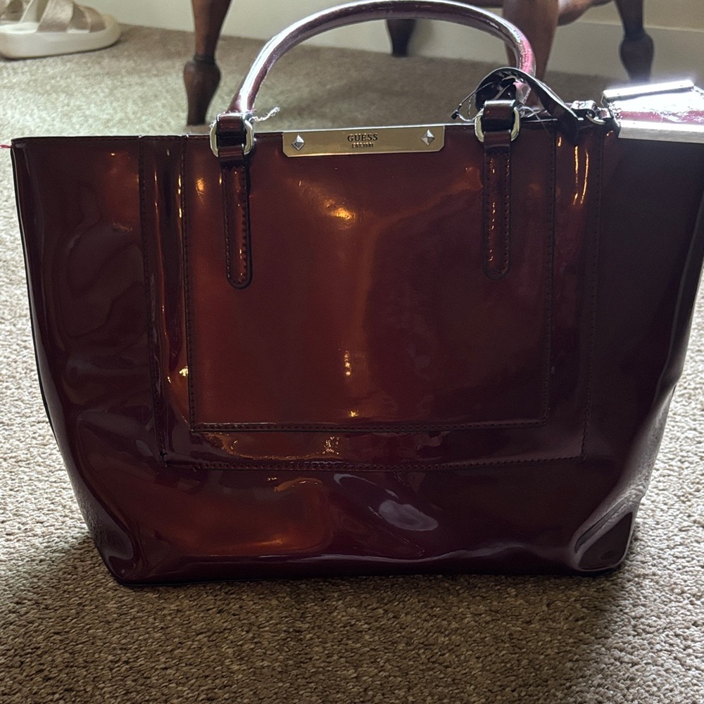 Guess Burgandy Tote.  Used but in good condition.